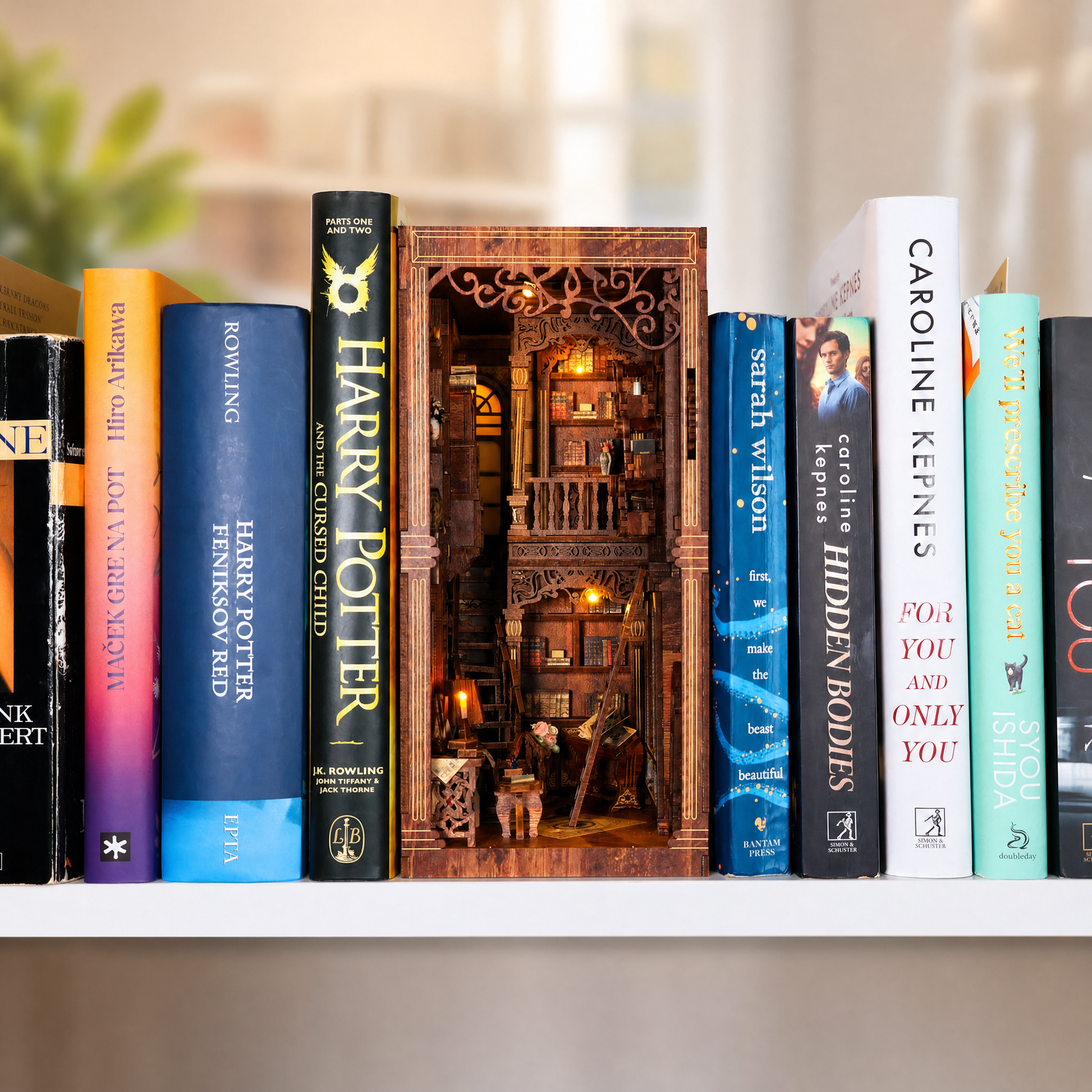 Video showing the Cozy Study Book Nook by Lubiwood, a DIY wooden miniature kit with a warm reading room scene for a bookshelf.